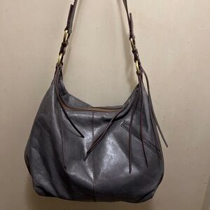 Hobo gray smooth leather hobo shoulder bag with leather tassels